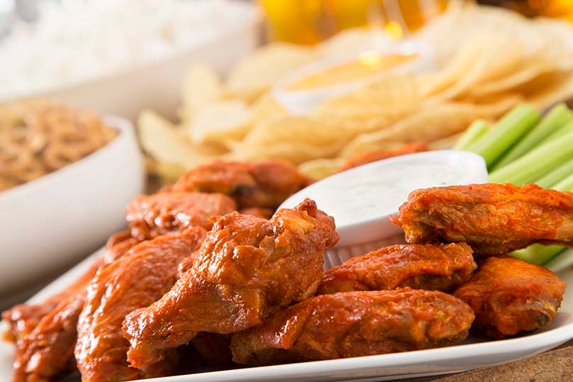 Game Day Snacks, chicken wings, celery, blue cheese, ranch, chips,pretzels, popcorn