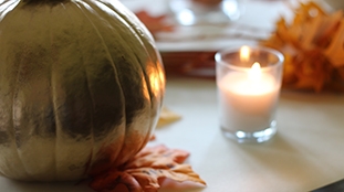 Pie Pumpkin and votive candle