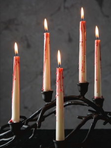 candles with dripping blood