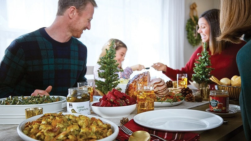 Happy family enjoying a holiday meal at the dinner table