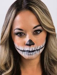 Woman with Skeleton makeup painted on face